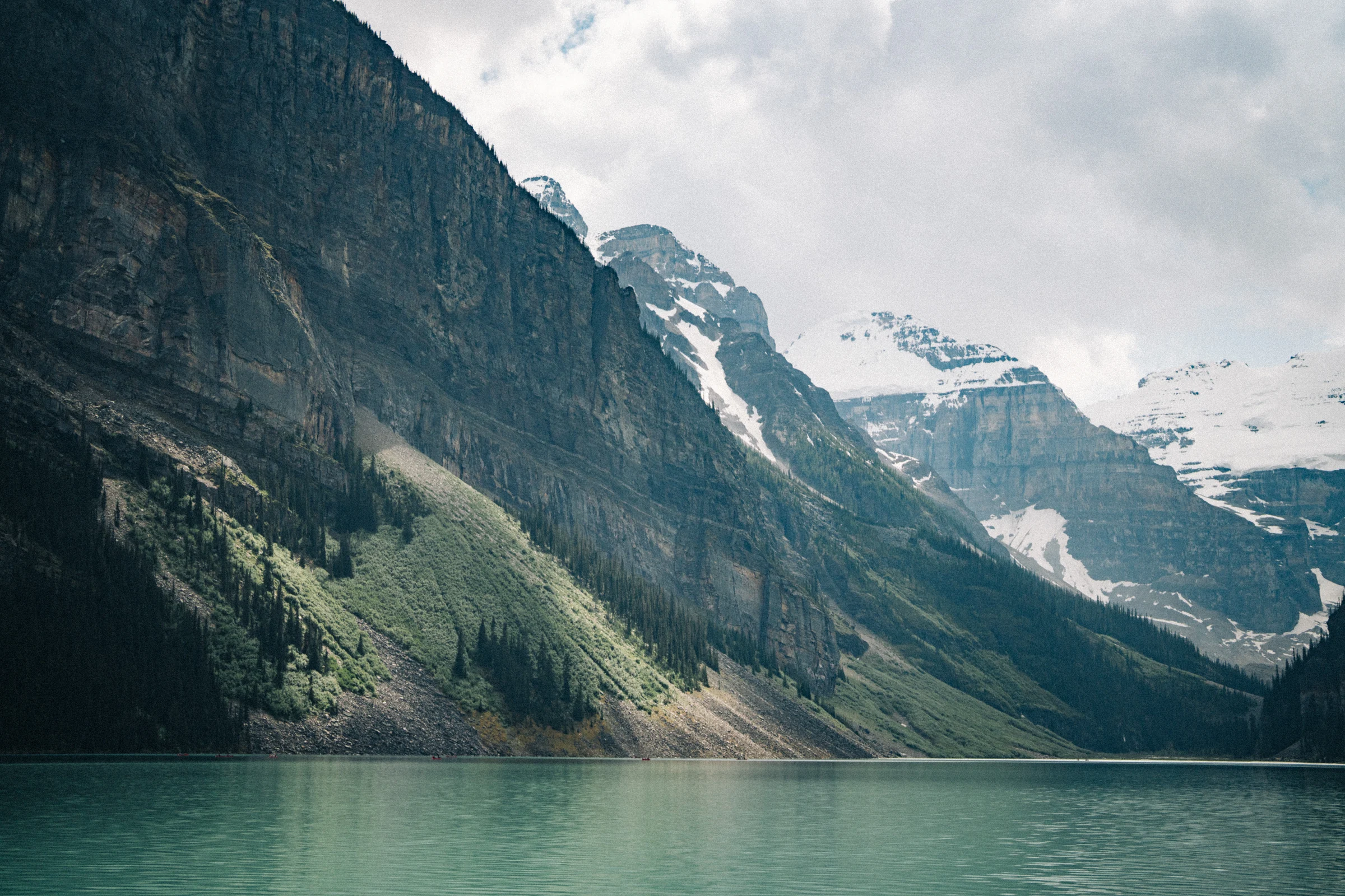 Lake Louise in Banff National Park and the snow-covered slopes at the far end of the lake.