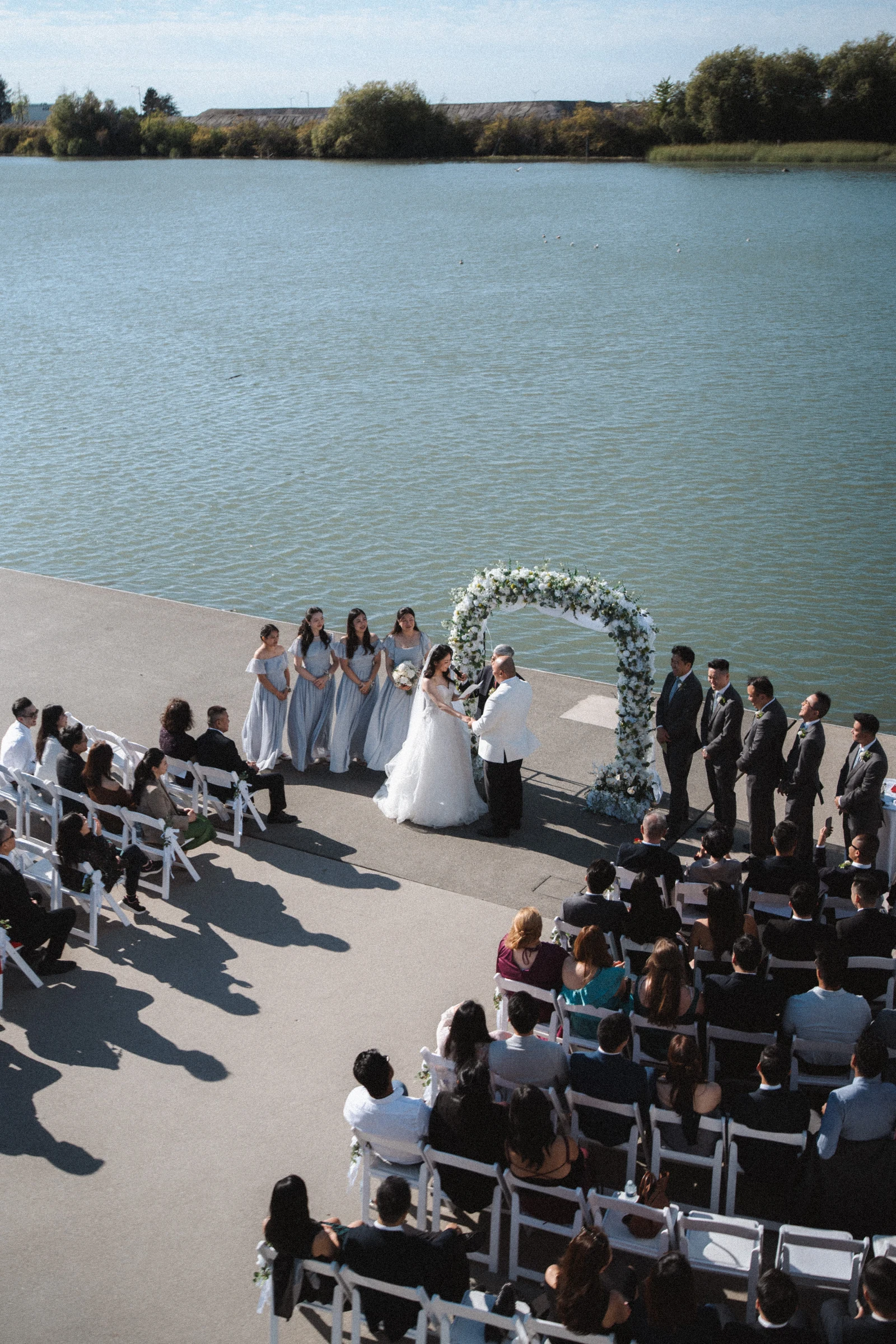 Elevated view of the ceremony on the waterfront deck.