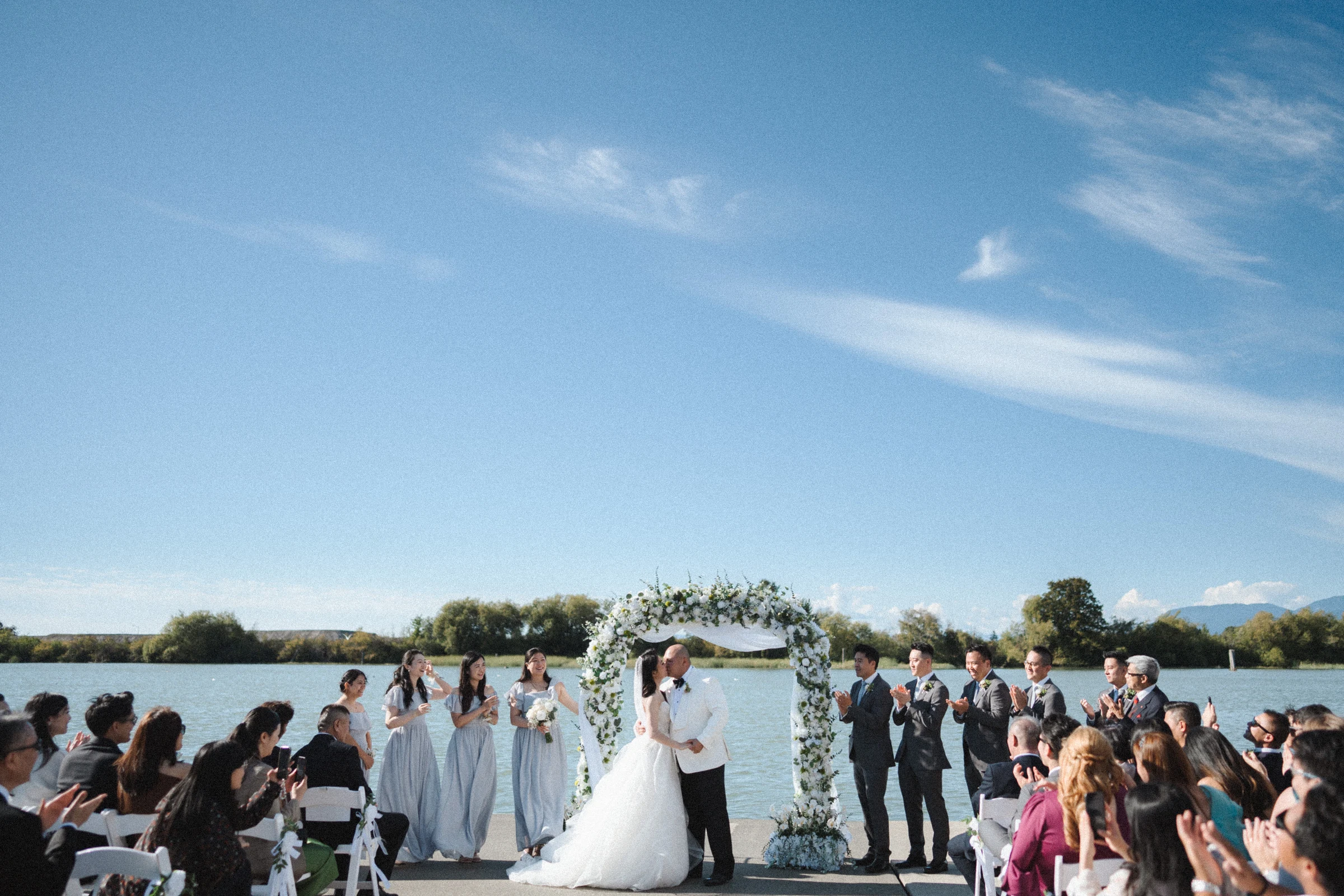 Wide view of the ceremony as the guests watch the couple.