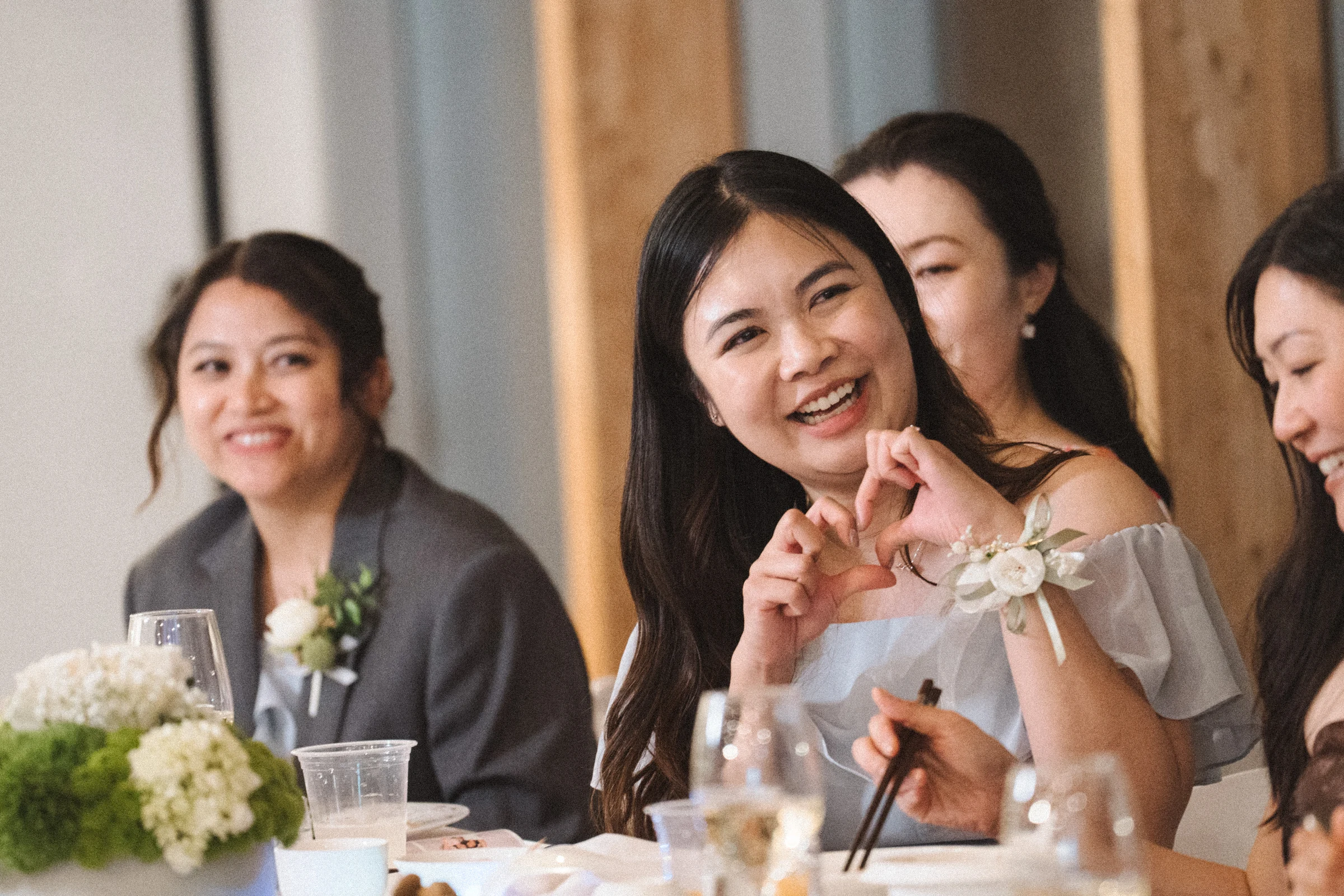 Guests watching the reception speeches with a smile.