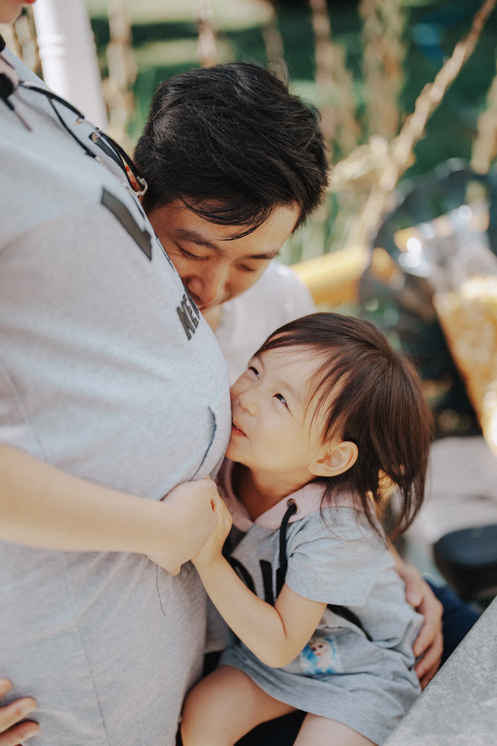 This one’s tender. The way they leaned in, the way the child looked up—it felt quiet and full. I didn’t need to say anything. Just watched it unfold.