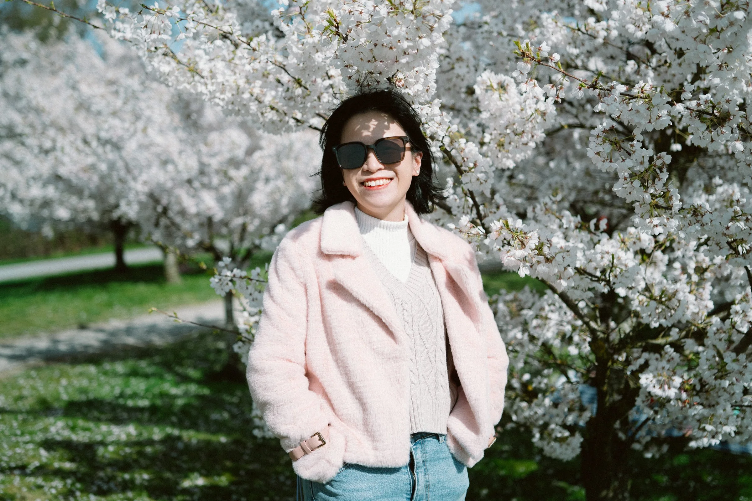 A smile as bright as spring. The perfect harmony of nature and joy.