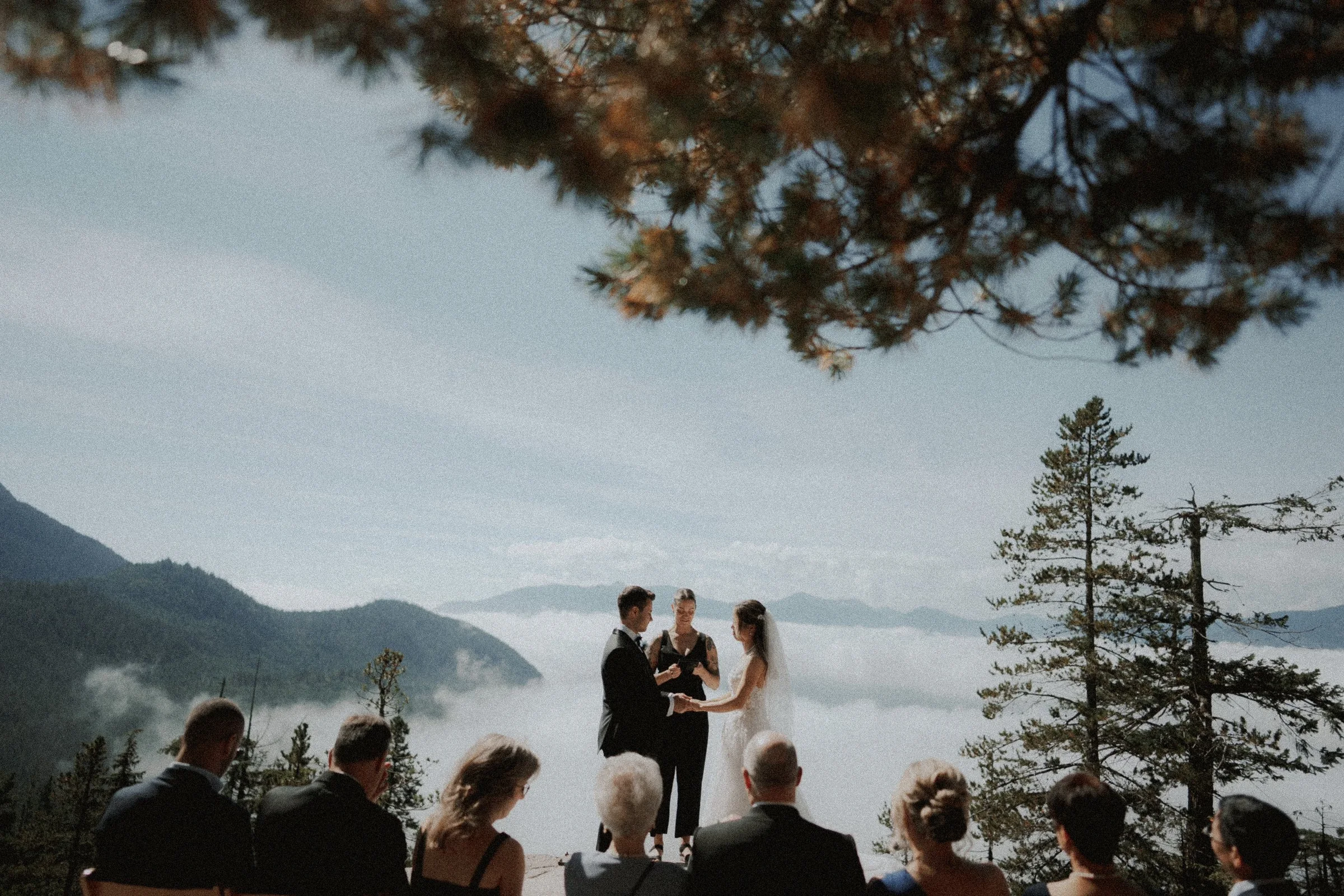 Guests watching the bride and groom exchange vows at Sea to Sky Gondola.