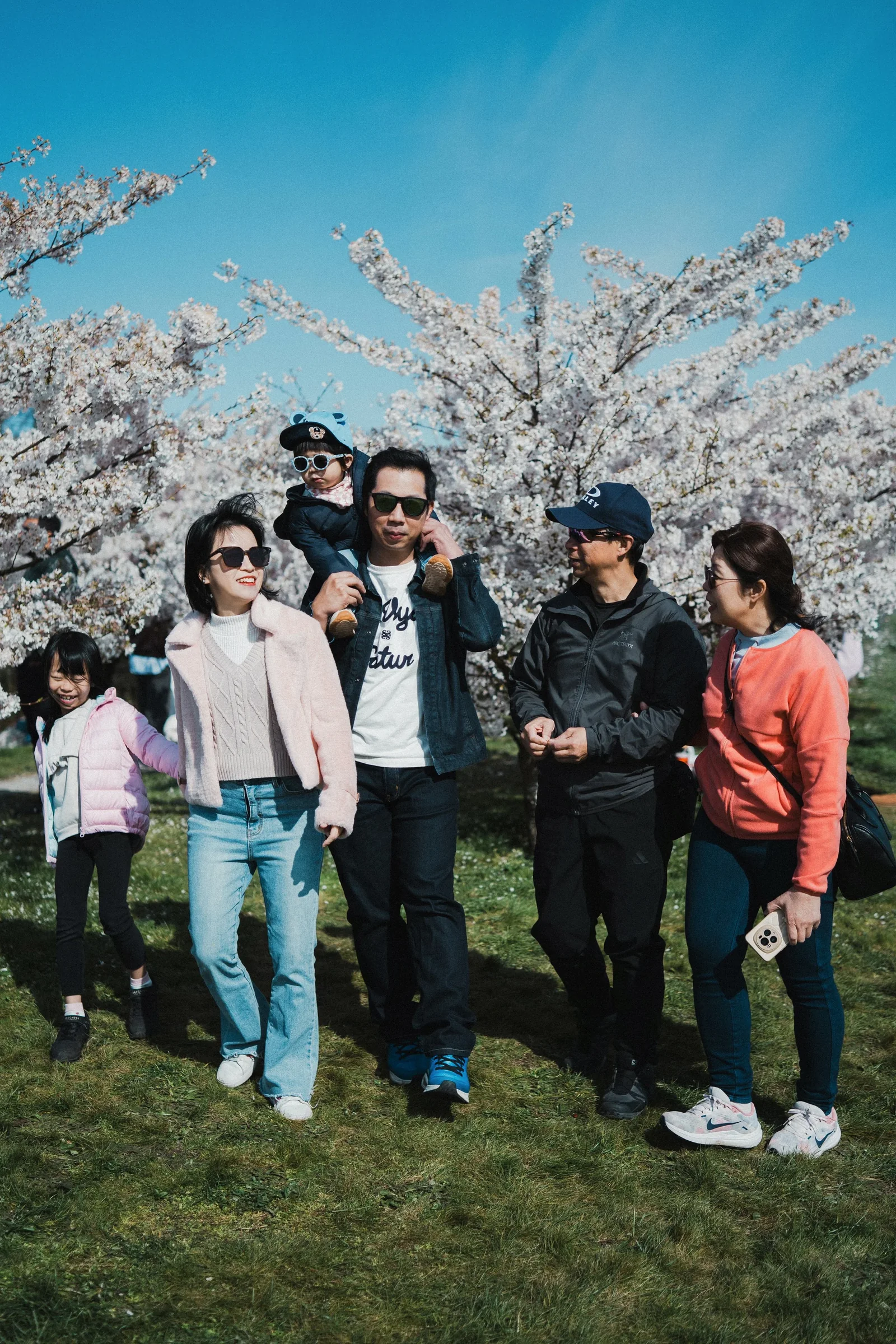 Life in motion. We believe the best family portraits happen between the poses—the laughter shared while walking, the gentle glances, and the simple joy of being together under the Vancouver sun.